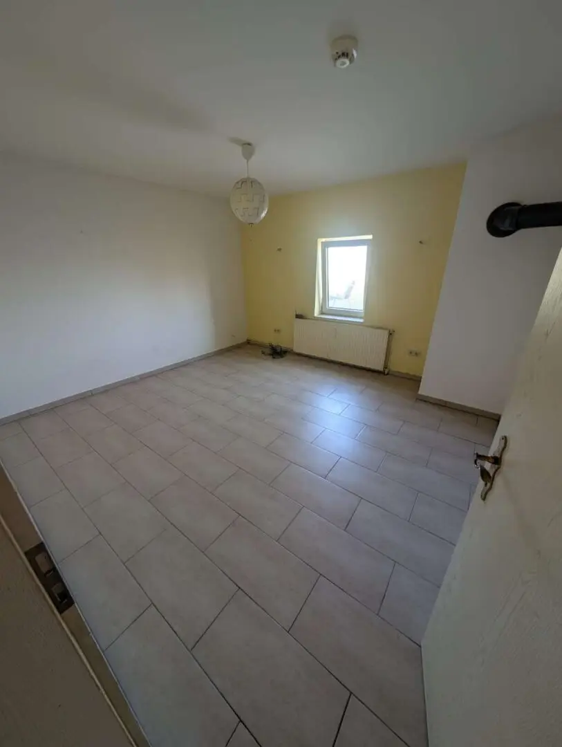 Schlafzimmer EG Whg.1 geräumt