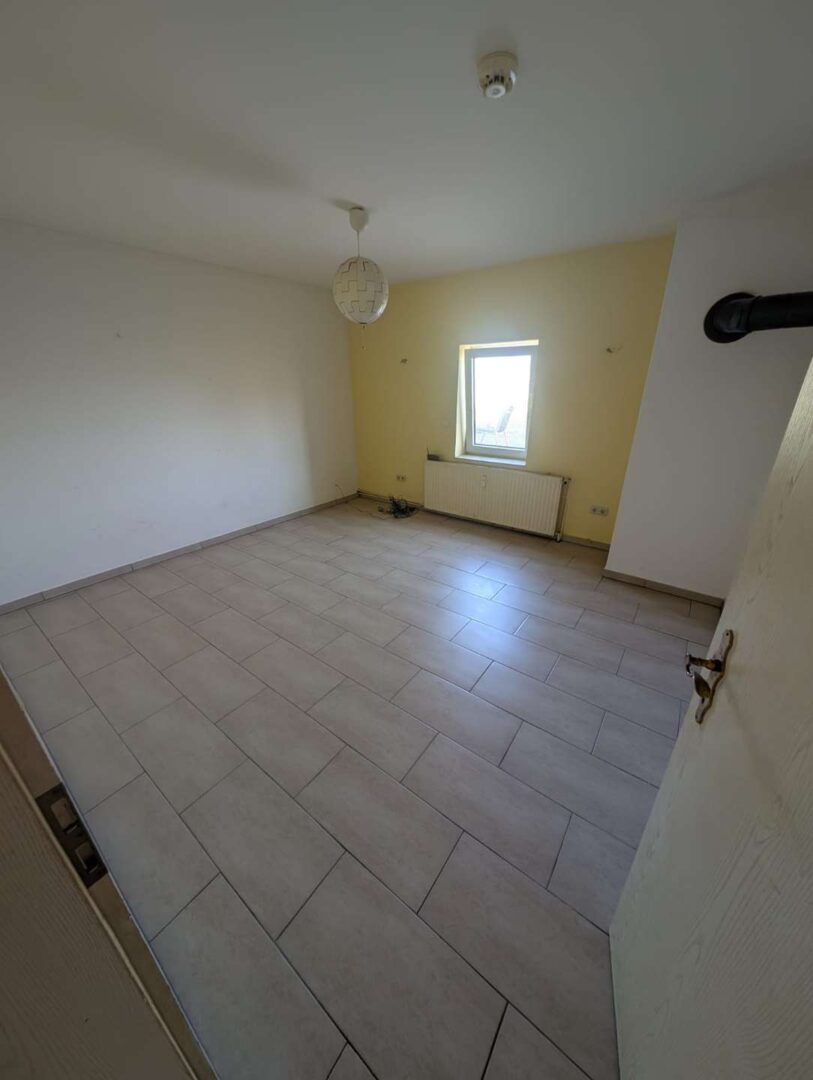 Schlafzimmer EG Whg.1 geräumt